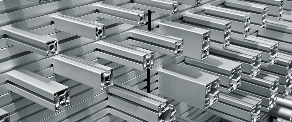 T-SLOT ALUMINUM EXTRUSIONS VS. PIPES AND JOINTS T-SLOT ALUMINUM EXTRUSIONS VS. PIPES AND JOINTS