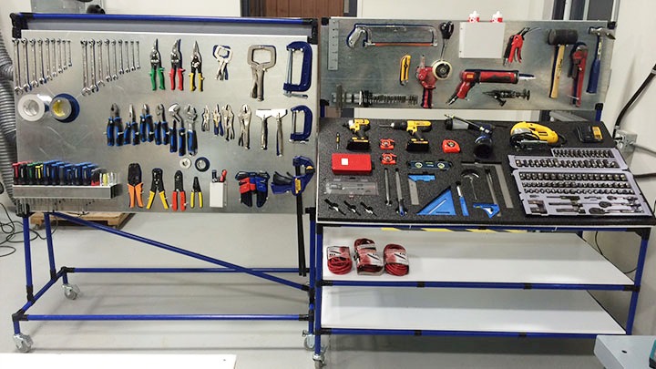 5S toolboard with blue frame, organized tools, and foam inserts for electrical equipment assembly
