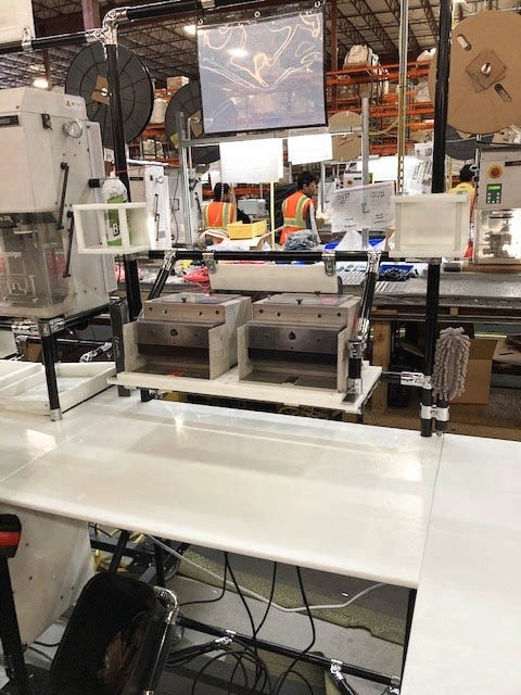 Modular multi-use workstation mount for the electrical equipment industry, offering versatile tool and component storage in a 5S environment