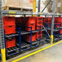 Flow racks to store bins under pallet racking Flow racks to store bins under pallet racking