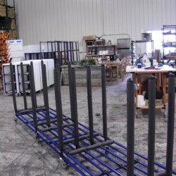 Cart with tubes to hold and separate large parts