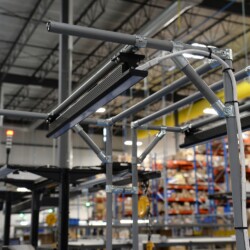 Sophisticated overhead modular pipe system in an electrical equipment manufacturing facility